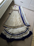 Ivory and blue wedding outfit