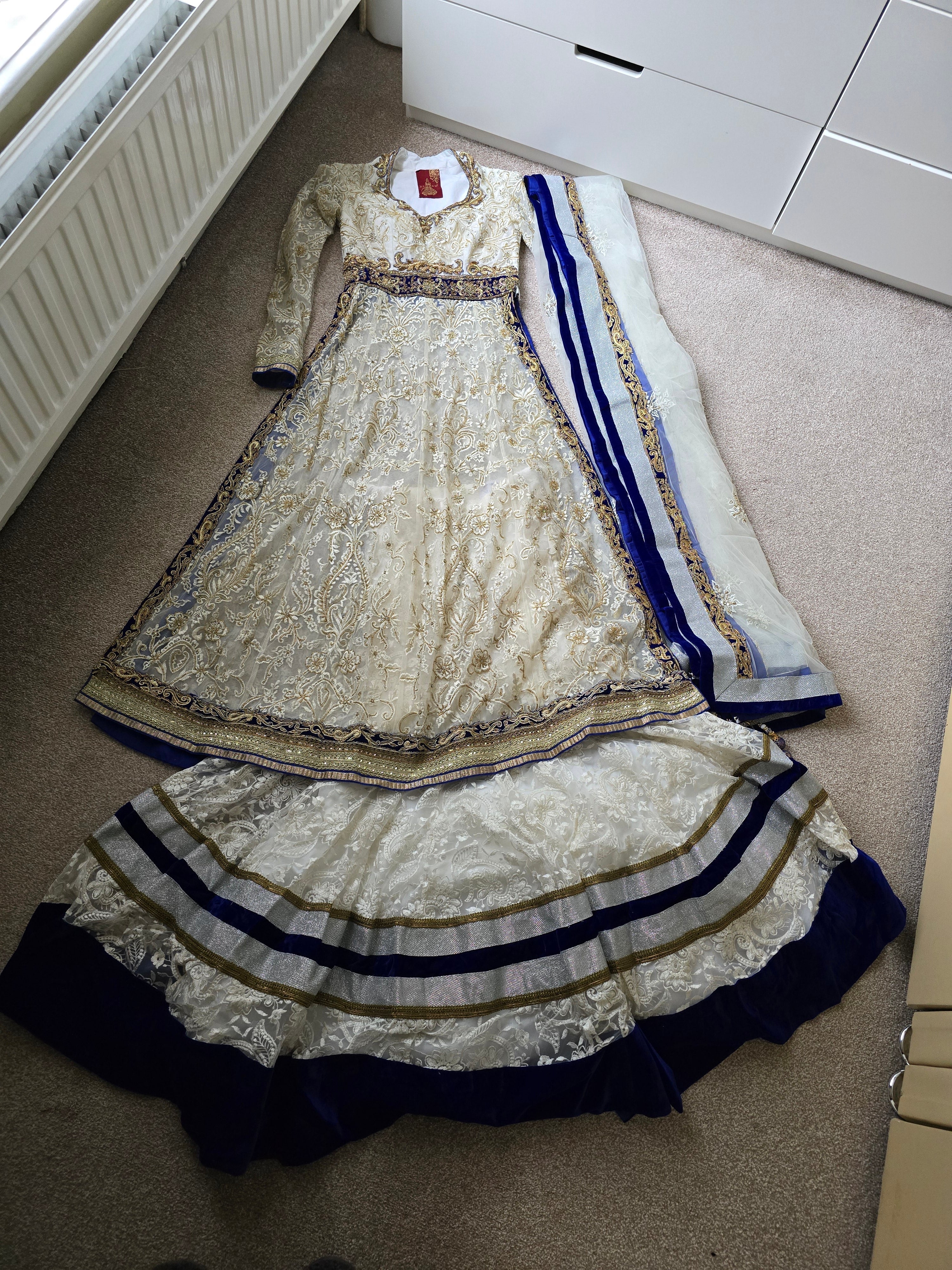 Ivory and blue wedding outfit