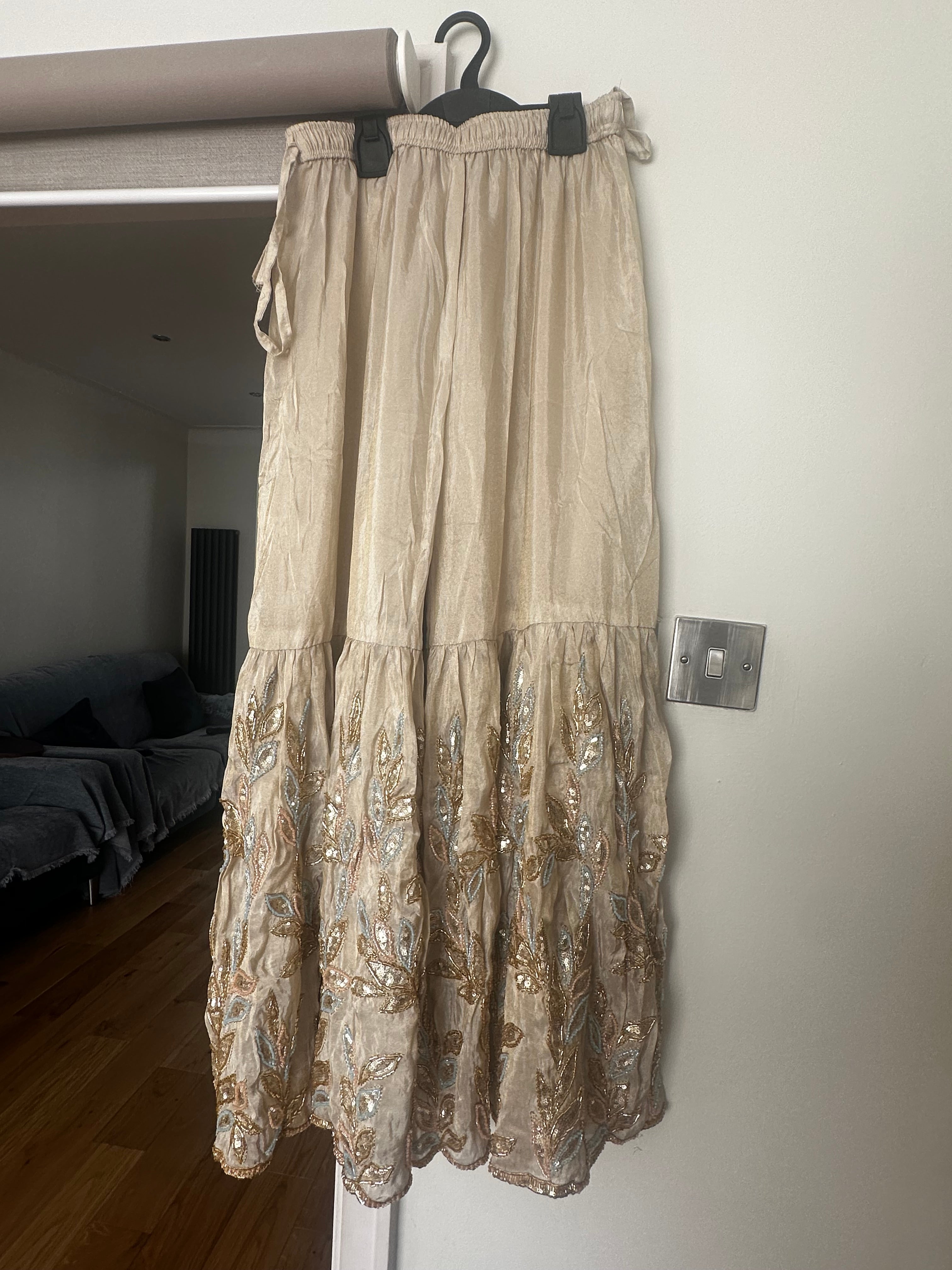 Top and Gharara gold with multi accents