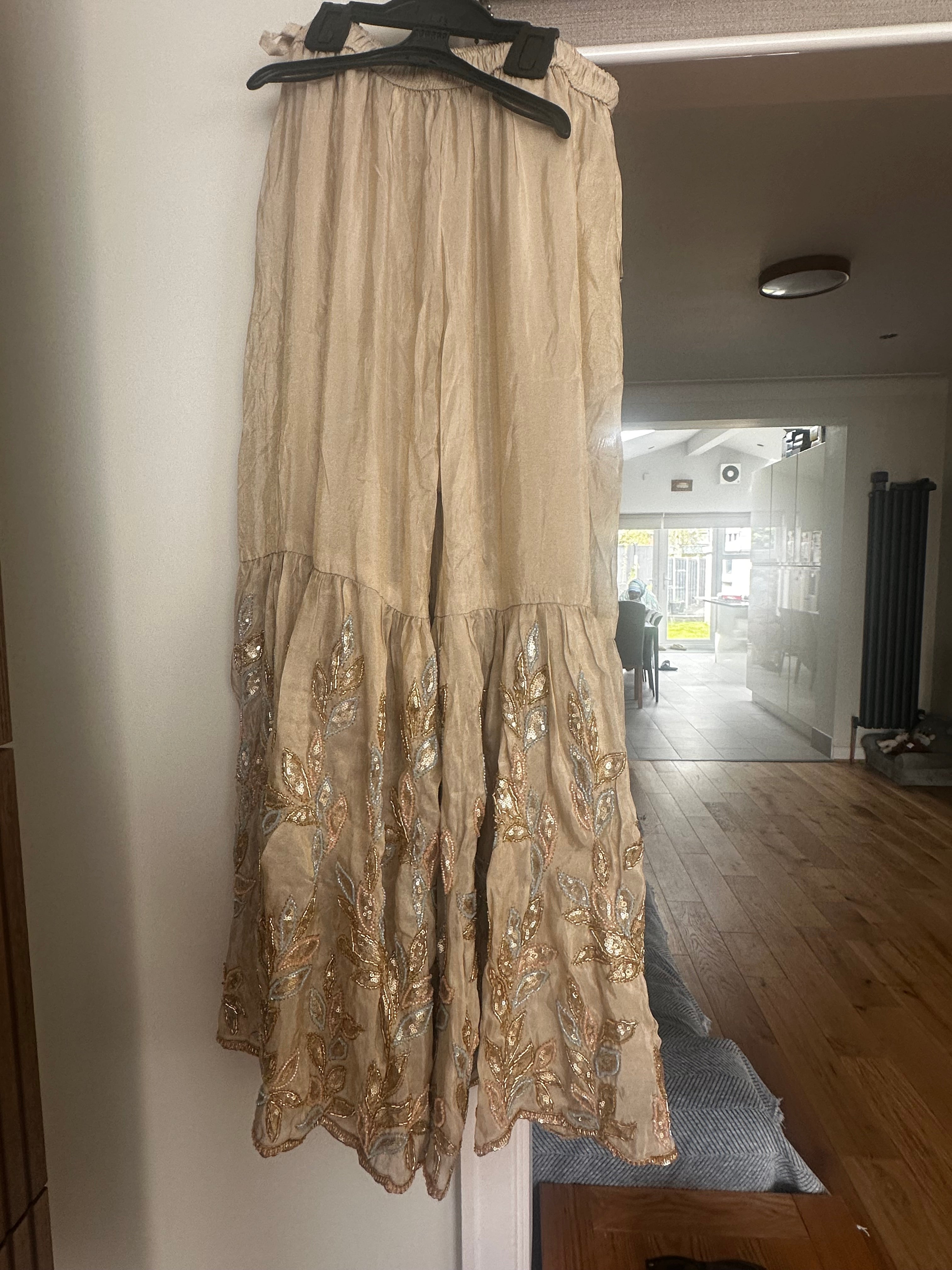 Top and Gharara gold with multi accents