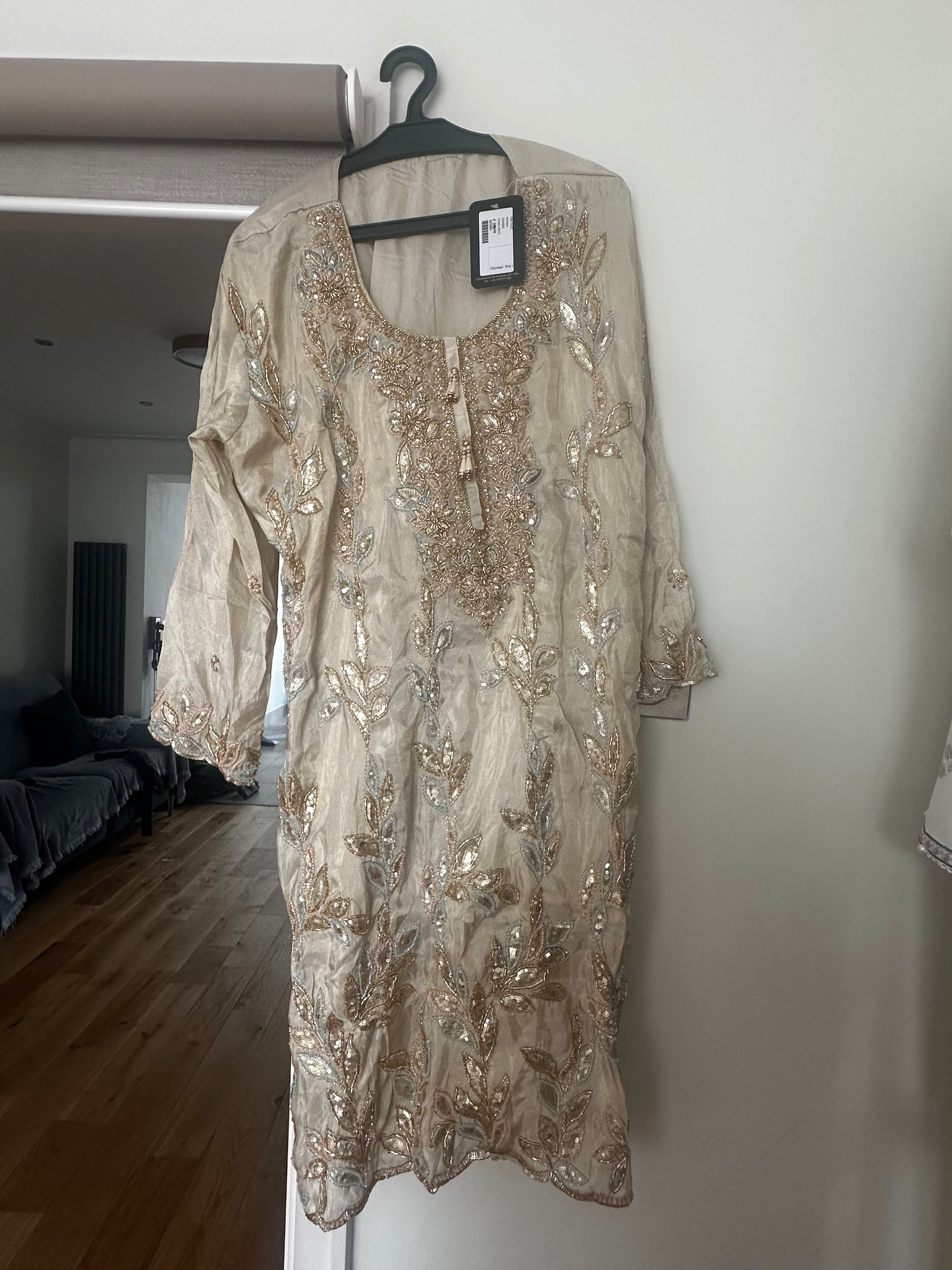 Top and Gharara gold with multi accents