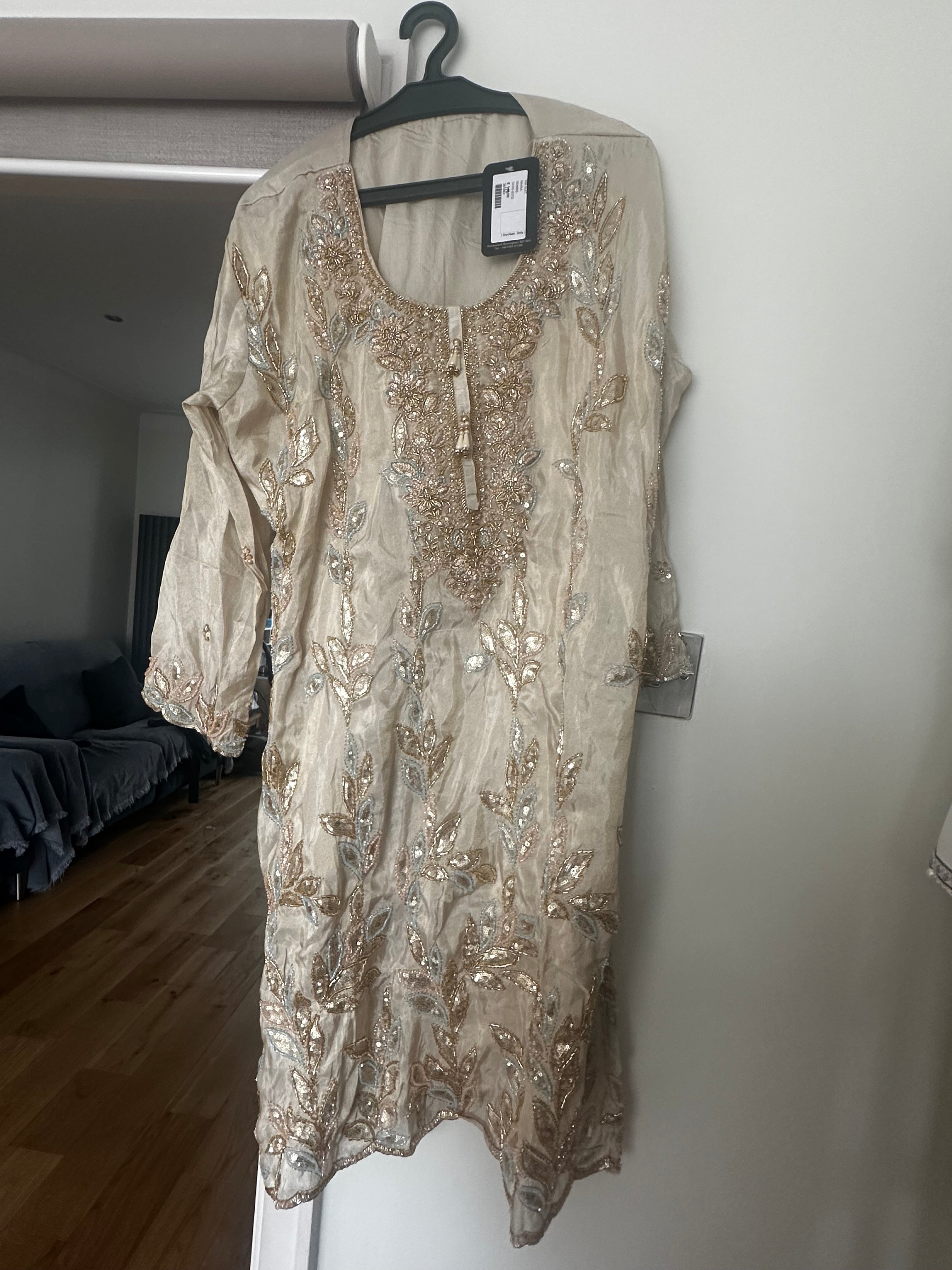 Top and Gharara gold with multi accents