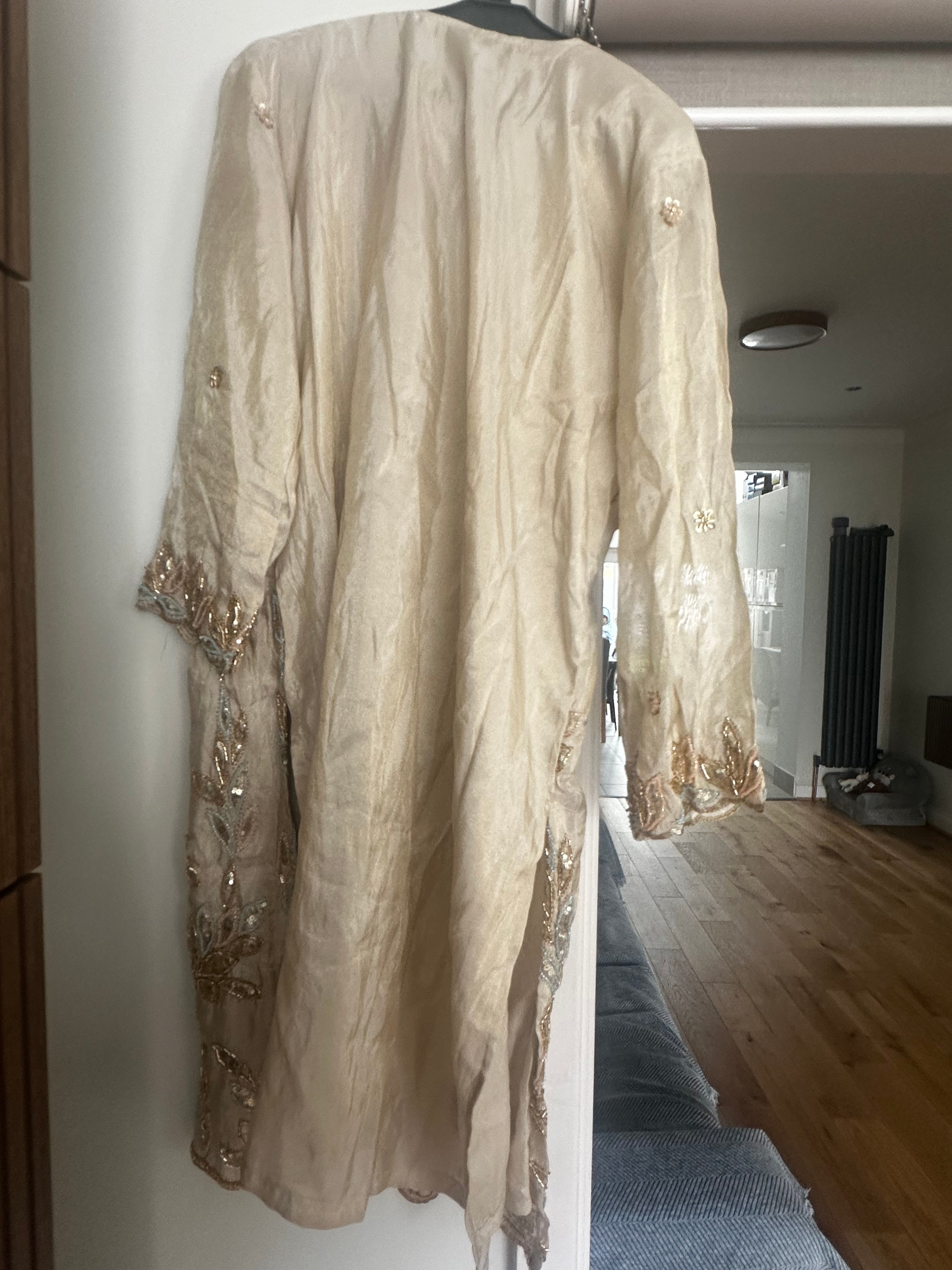 Top and Gharara gold with multi accents